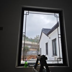 断桥铝中式仿古门窗安装效果图