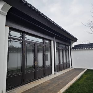 断桥铝中式仿古门窗安装效果图
