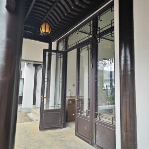断桥铝中式仿古门窗安装效果图