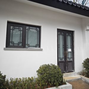 断桥铝中式仿古门窗安装效果图
